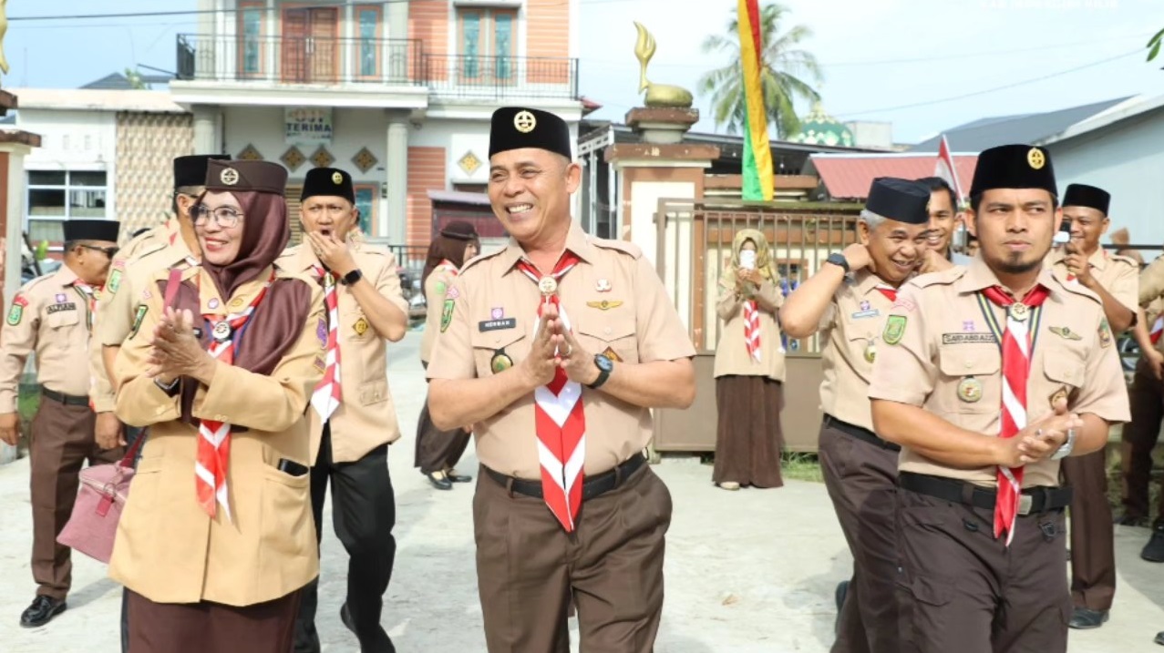 Bupati Inhil Menjadi Irup Sekaligus Membuka Kegiatan Lomba Dalam Rangka Hari Pramuka Ke - 64 Tahun 2025