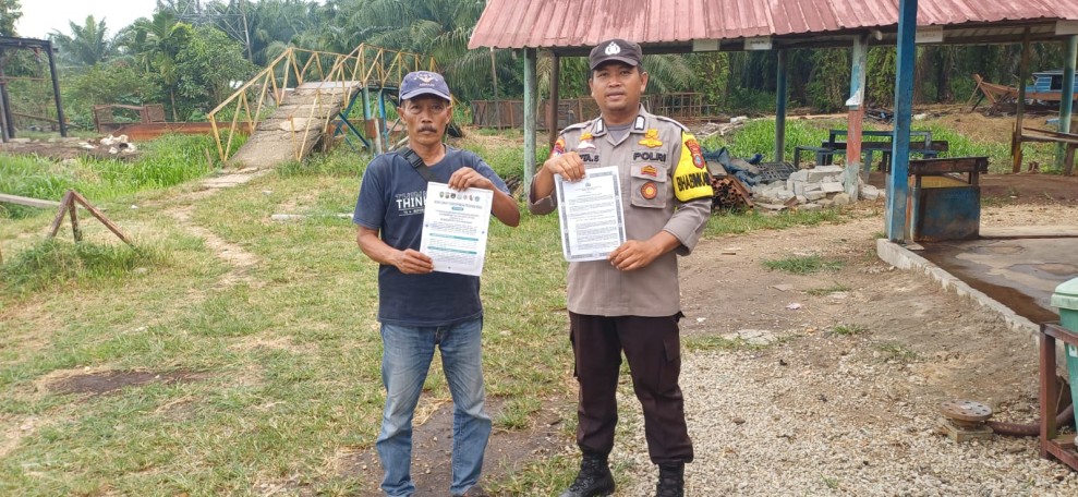 Bhabinkamtibmas Polsek Pelangiran Edukasi Warga soal UU Karhutla dan Bahaya El Nino