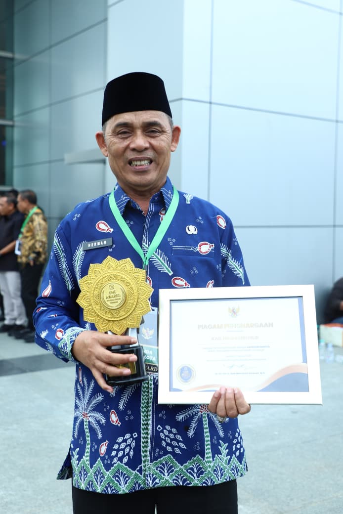 Bupati Inhil Terima UHC Awards 2026, Cakupan Jaminan Kesehatan Tembus 98 Persen