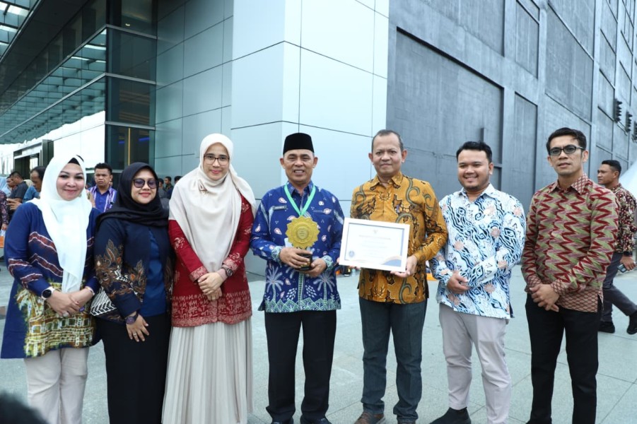 Apresiasi atas Capaian UHC Tahun 2025, Pemerintah Pusat Anugerahkan UHC Awards Madya kepada Kabupaten Inhil