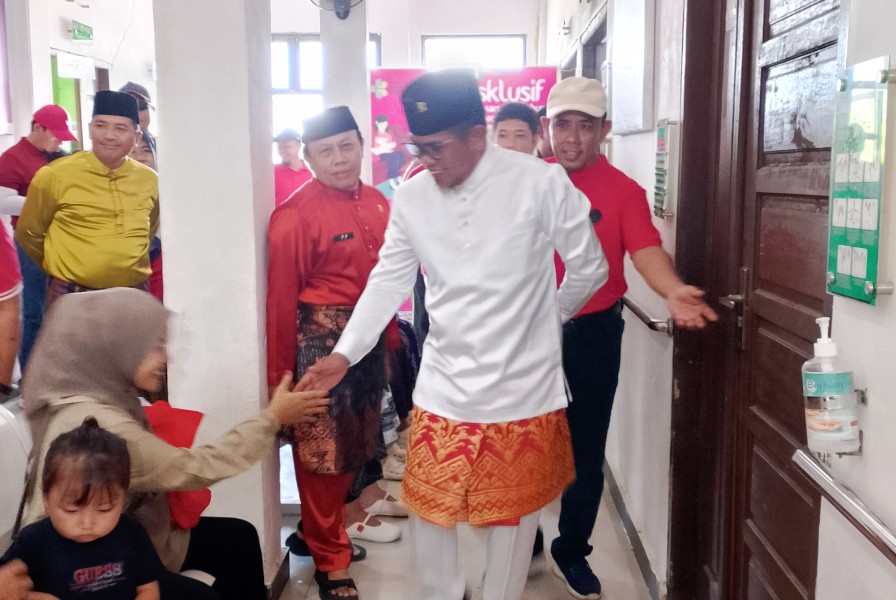 Hadiri HUT ke-25 Puskesmas Kerumutan, Bupati Zukri Imbau Nakes Layani Masyarakat Sepenuh Hati