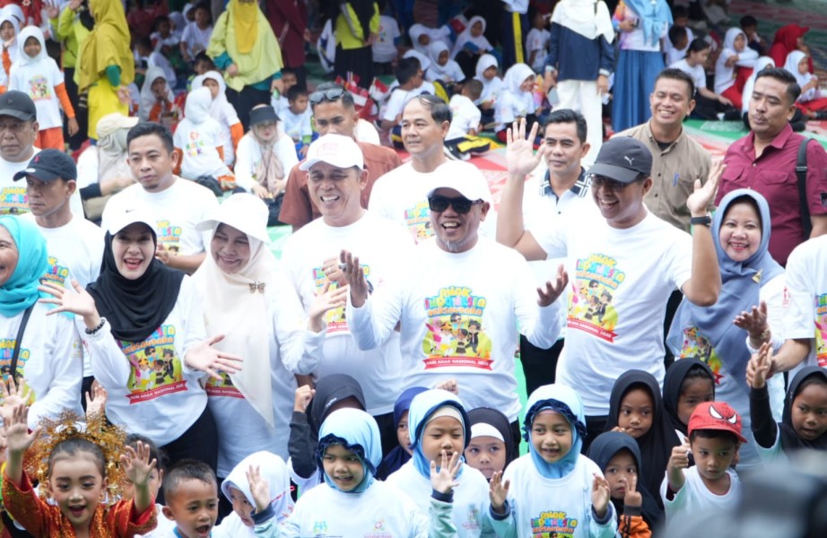 Hadiri Puncak HAN di Rengat, Bupati Zukri Komitmen Perkuat Perlindungan Anak di Pelalawan