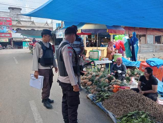 Dengan Semangat “Melindungi Tuah, Menjaga Marwah”, Polisi Ukui Jaga Pasar Tradisional