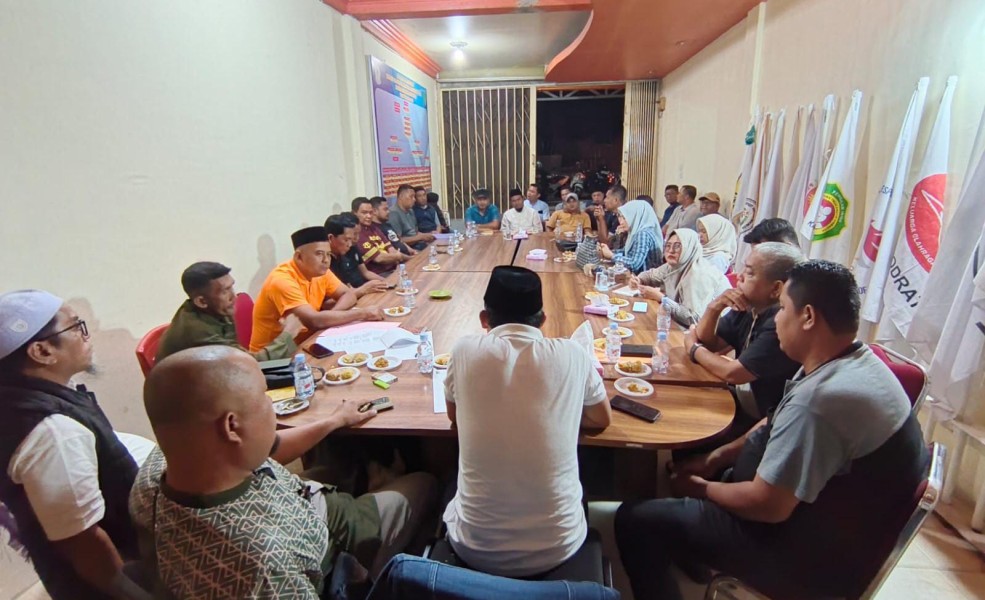 Zainudin Acang Pimpin Rapat Perdana Pengurus Baru KONI Inhil