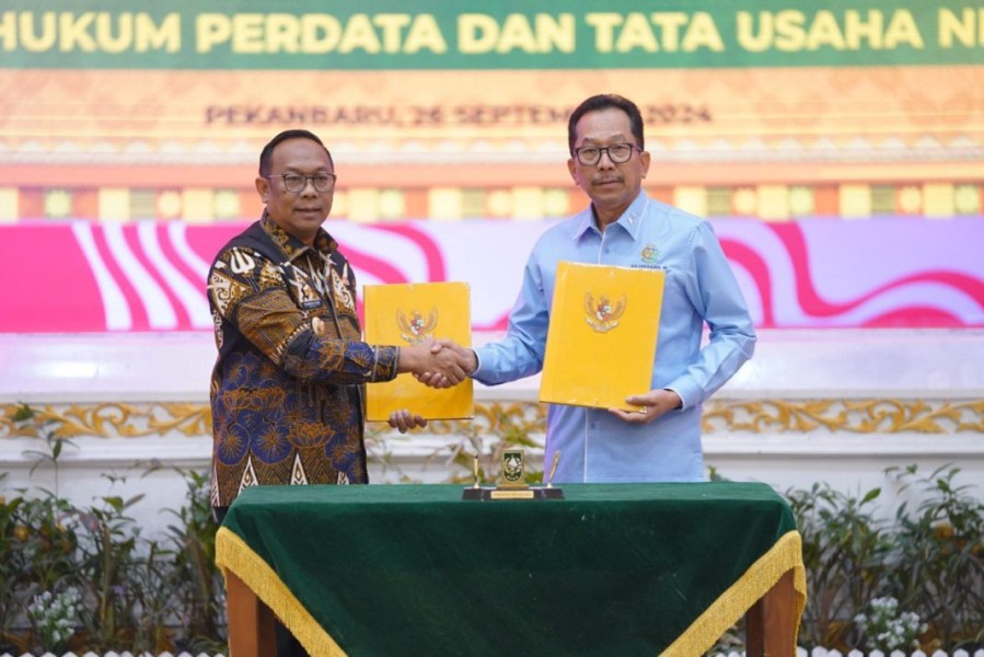 Kolaborasi Strategis, Pj Gubri dan Kajati Riau Tandatangani Nota Kesepahaman Bantuan Hukum